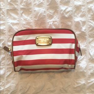 Michael Kors Red and White Stripe Cosmetic Bag.